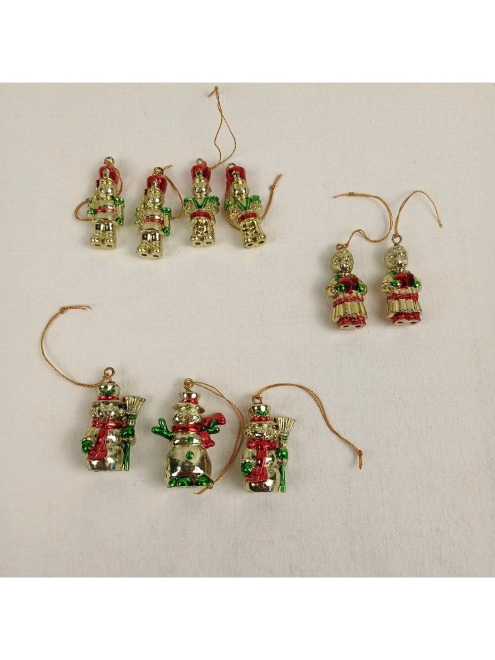 Miniature gold tone plastic Christmas Ornaments Soldier Caroler Snowman